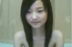 Chinees meisje vingert voor de webcam